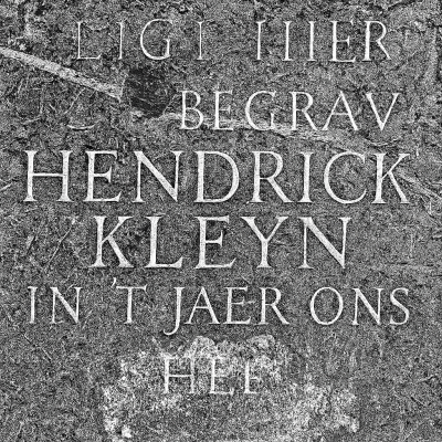 A_black_and_white_photograph_showcases_an_aged_sto.png